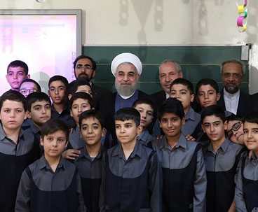 President Rouhani symbolically rings school bell