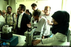 Foreign academics in an exhibition displaying latest achievements of Sharif University