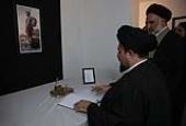 Ayatollah Seyyed Hassan Khomeini signs a memorial book to commemorate the late Cuban Leader Fidel Castro 