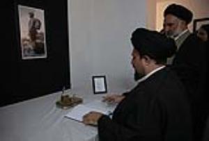 Ayatollah Seyyed Hassan Khomeini signs a memorial book to commemorate the late Cuban Leader Fidel Castro 