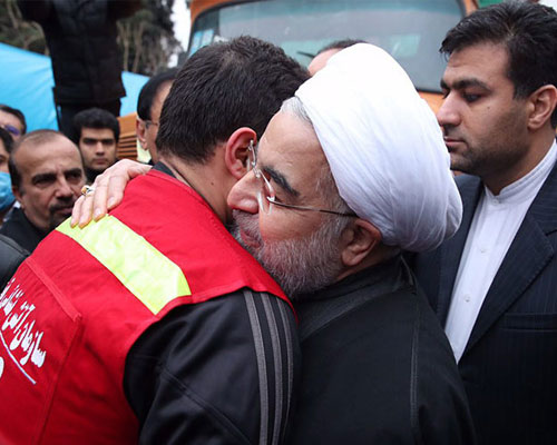 Iranian President Hassan Rouhani visiting collapsed building site 