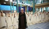 Female students at a ceremony in Hosseniah Jamaran vow to observe their religious duties 