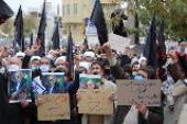 Students in the Iranian city of Qom rally to denounce the brutal assassination of nuclear scientist, Fakhrizadeh