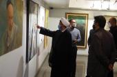 On the 32nd passing anniversary of Imam Khomeini, the acting head of the institute for compilation and publication of Imam Khomeini`s works visit an art and cultural exhibition 