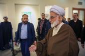Ayatollah Durri Najafabadi, the representative of leader in central Arak Province, visits stalls and oversees activities during Imam Khomeini cultural week .