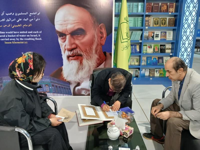 Foreign guests visiting the international booth at the 35th Tehran International Book Fair